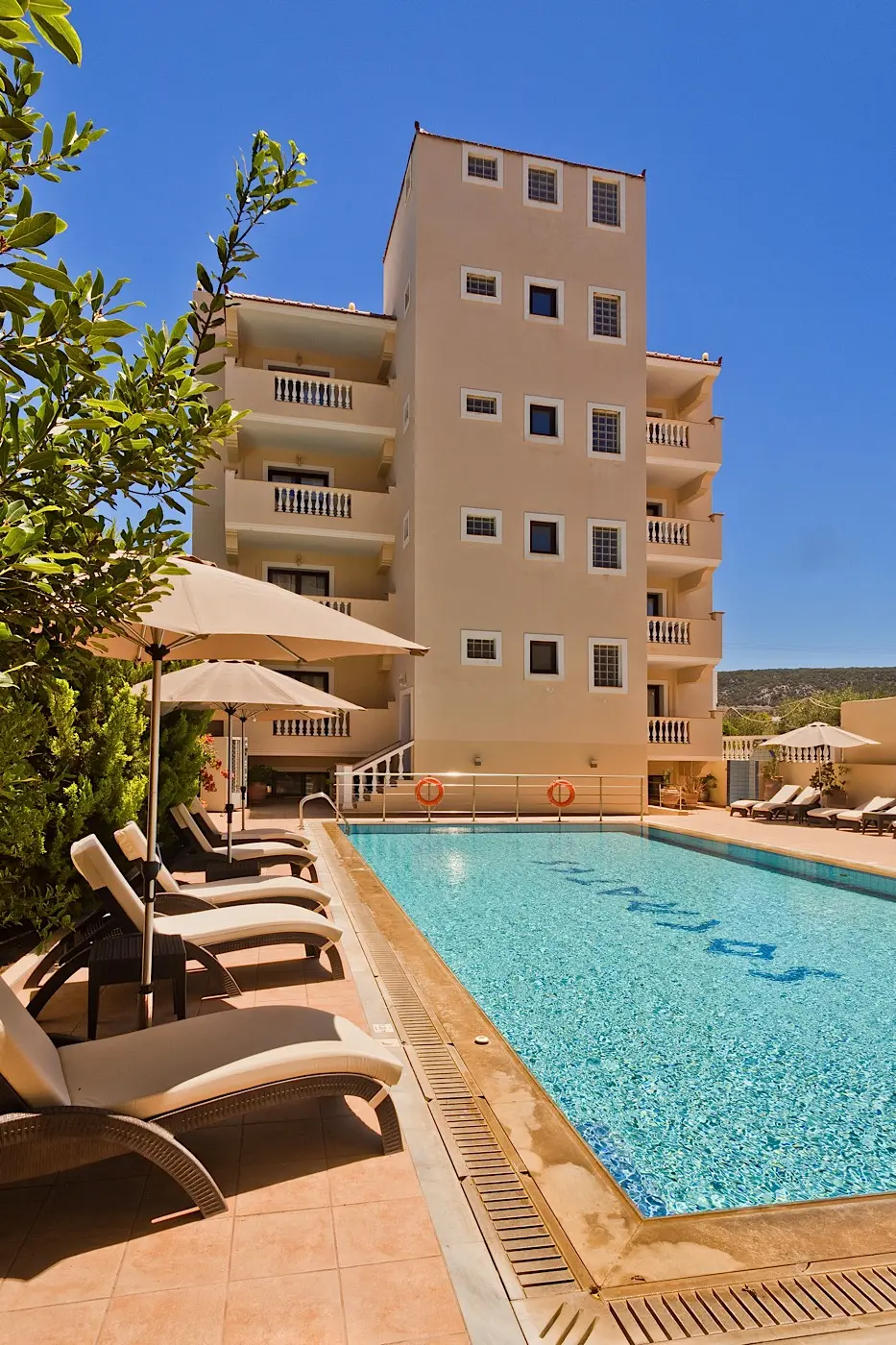 Swimming pool and hotel exterior